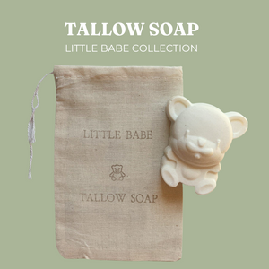 Live Tallowed bear-shaped tallow soap from the Little Babe Collection, made with calendula-infused olive oil. A gentle, all-natural soap designed for delicate and sensitive skin. Displayed against a soft desert green jojoba and natural linen bag background with product branding.